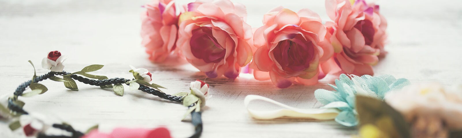 pink and blue flowers used as a crown pink and blue flowers used as a crown