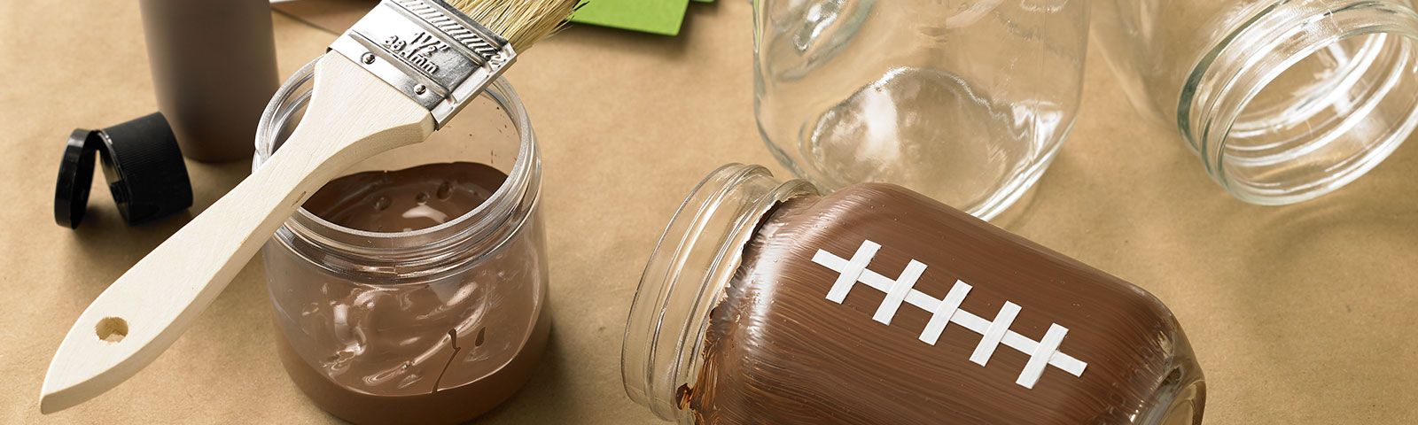Mason jars painted as footballs